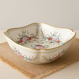 Old hollow porcelain dish with floral decoration and gold trim