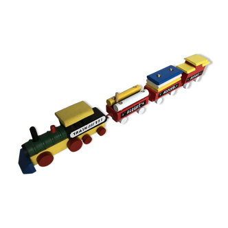 Small vintage train in multicolored wood