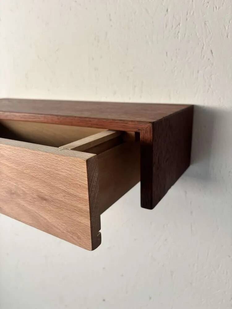 Vintage floating commode in teak and beech wood from the 1960s.