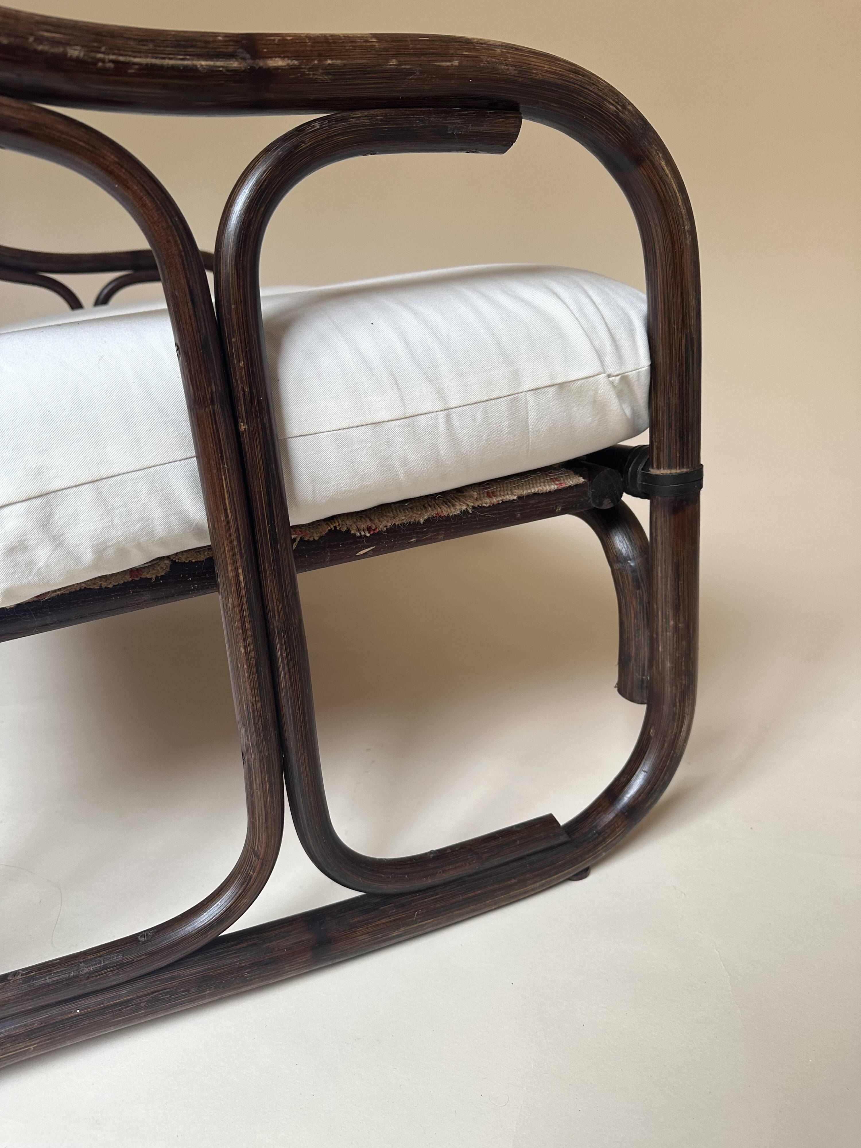 Two-seater rattan bench