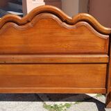 Double bed in solid oak.