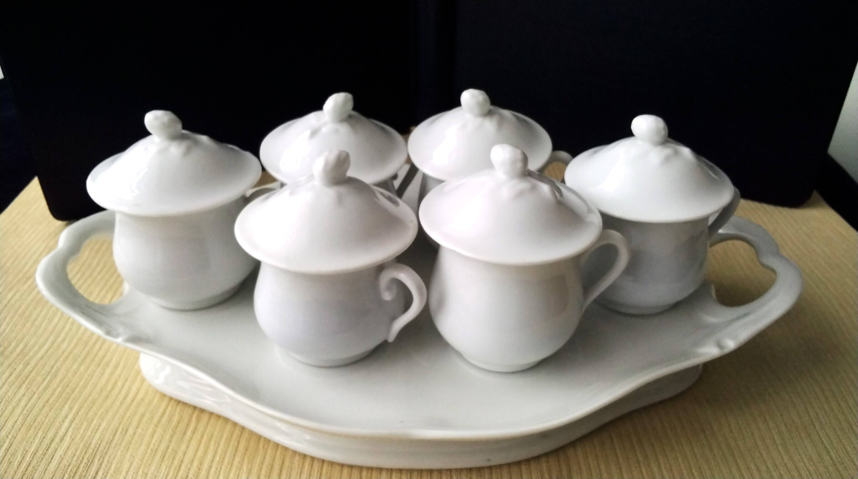 Antique white porcelain cream service