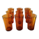 Lot de 9 gobelets hauts vintage en verre ambre