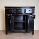 Chinese chest of drawers in black and gold lacquer