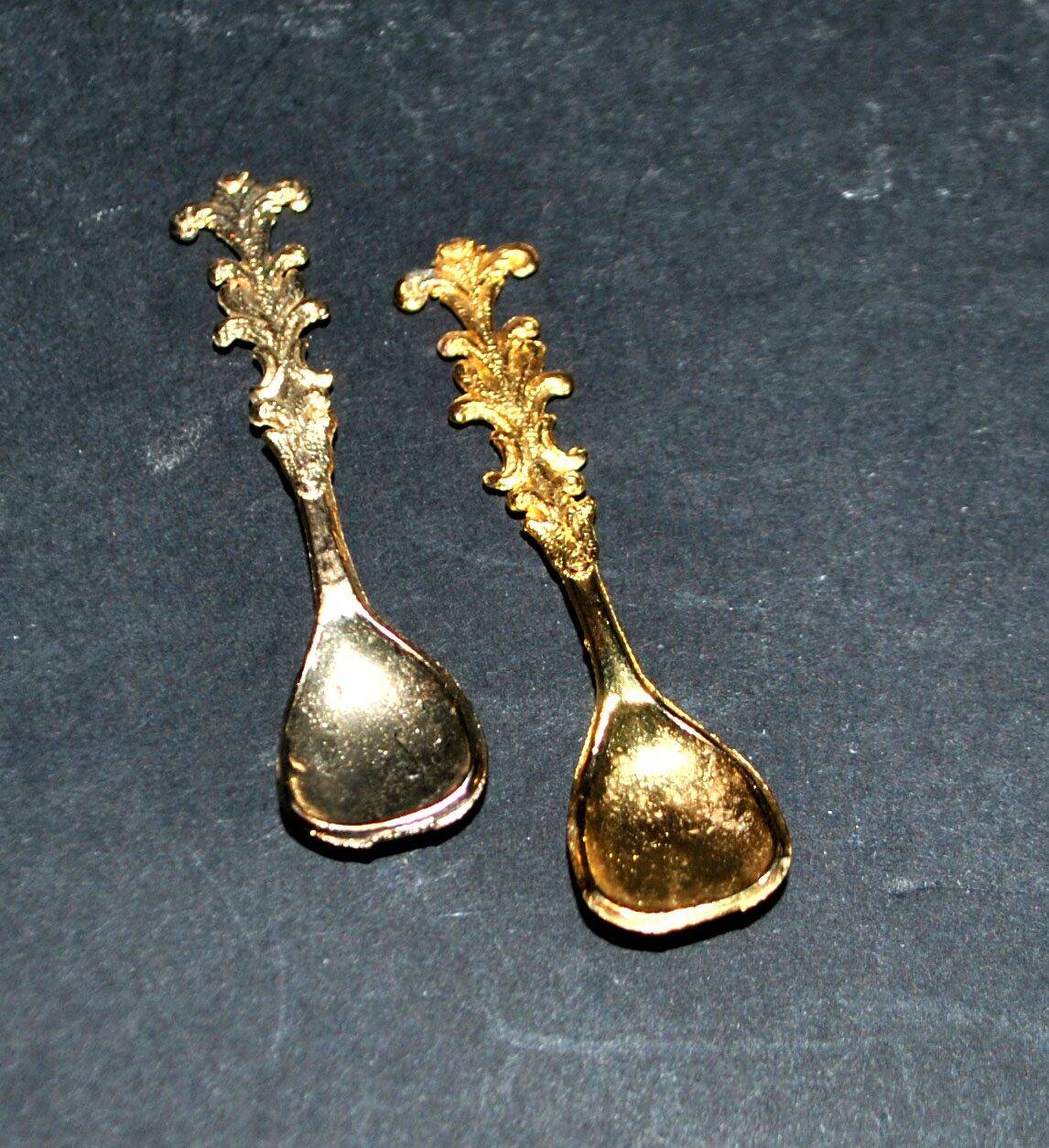 Set of 2 vintage gold metal salt spoons.