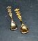 Set of 2 vintage gold metal salt spoons.