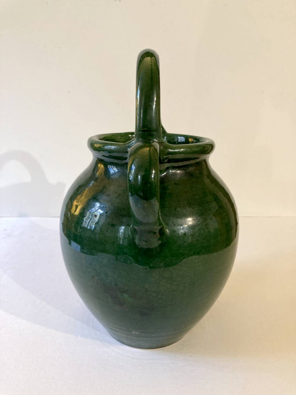 Emerald green glazed terracotta goat jug