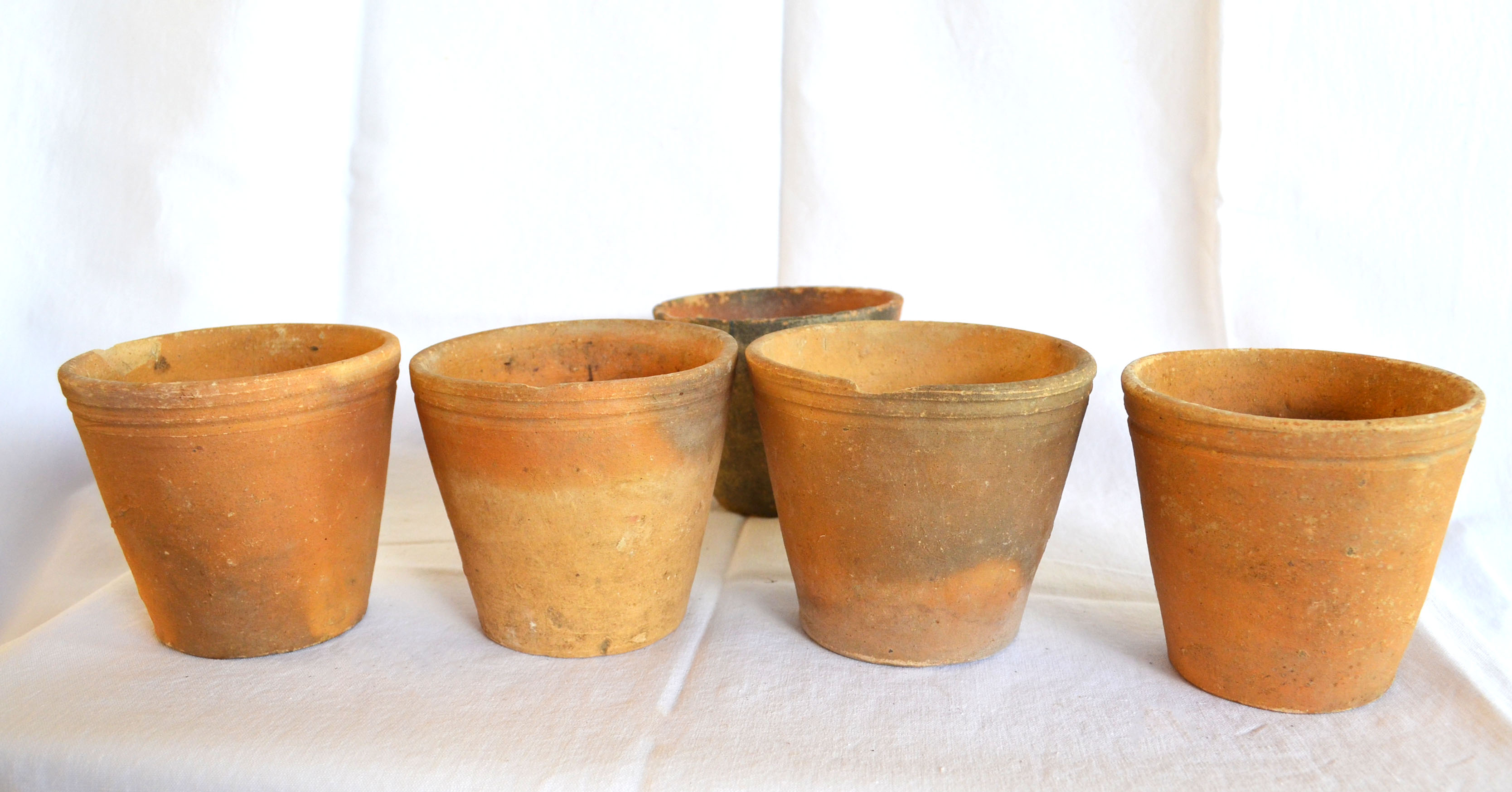 5 old terracotta pots