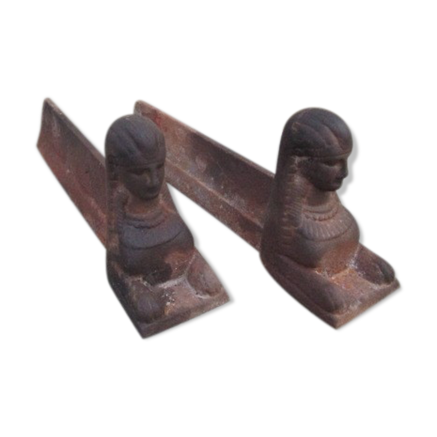 Pair of ancient cast iron chenets, Egyptian busts