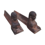 Pair of ancient cast iron chenets, Egyptian busts