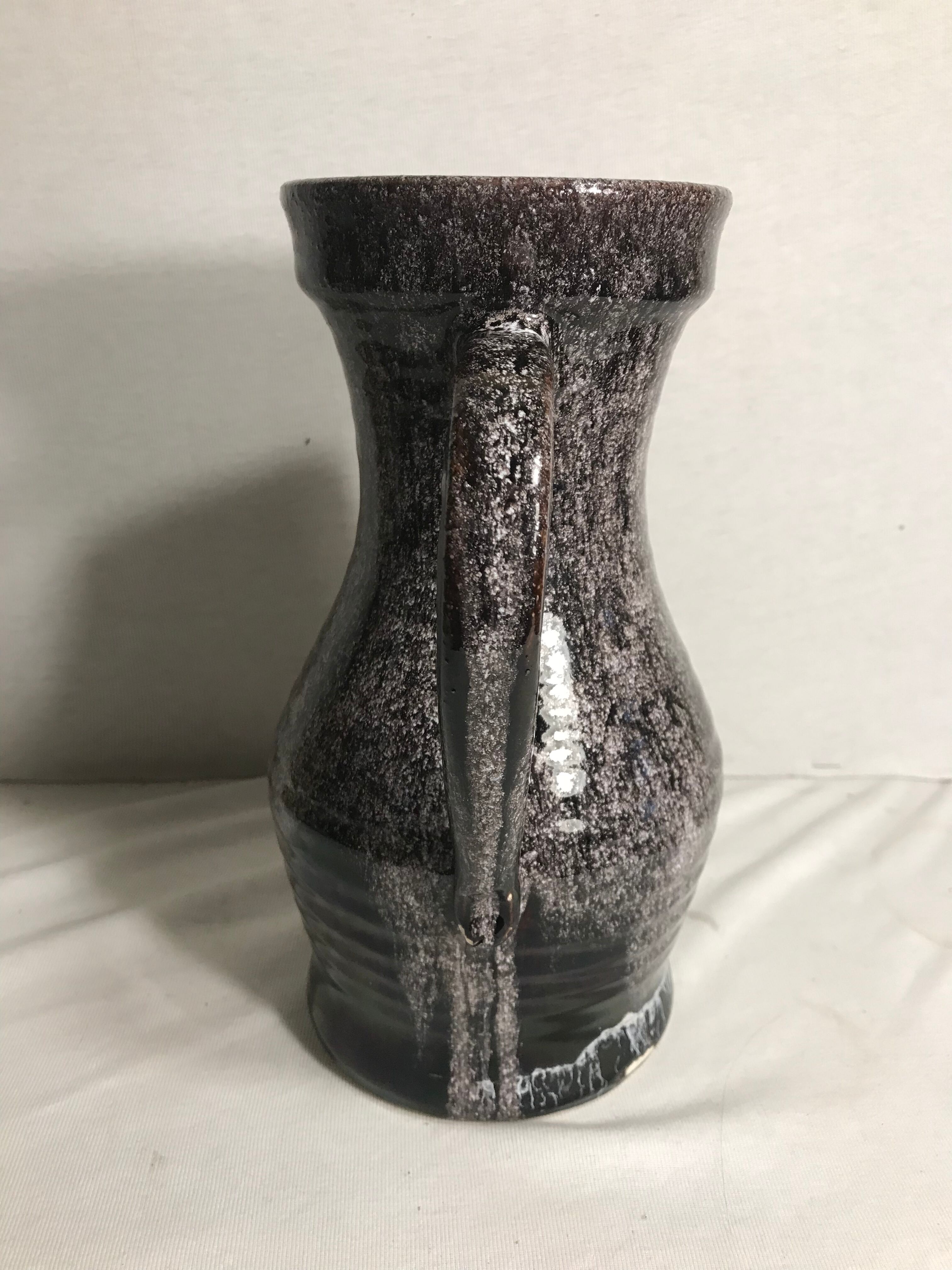 Old ceramic accolay jug, grey-black