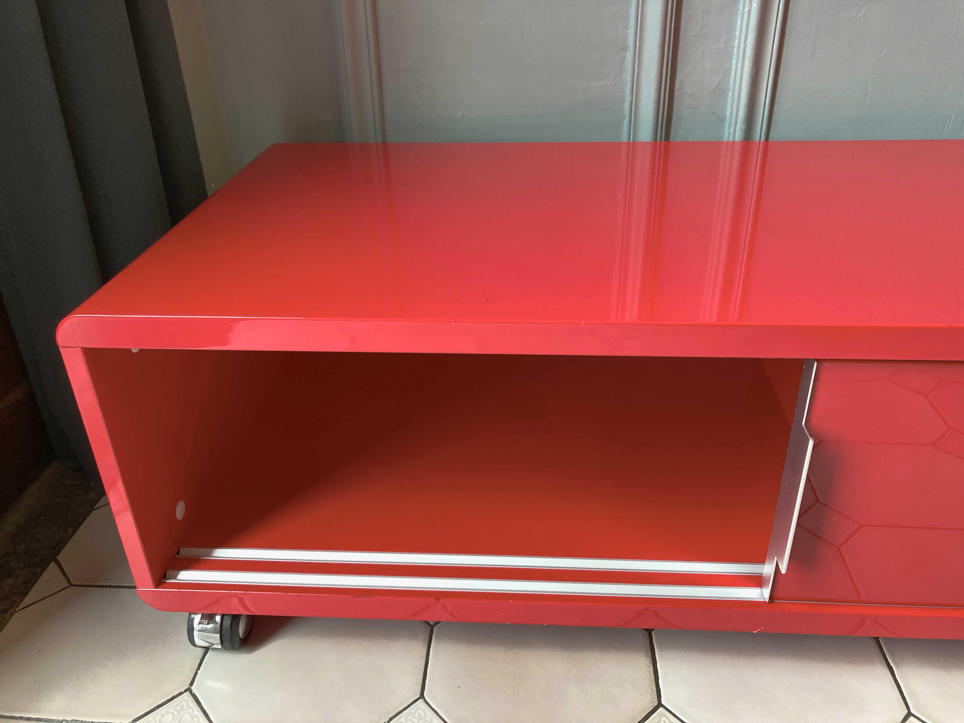 Lacquered red tv cabinet