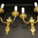 Pair of large Louis XVI style wall lights from the 19th century - gilded bronze