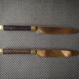 Pair of brass and wood knives