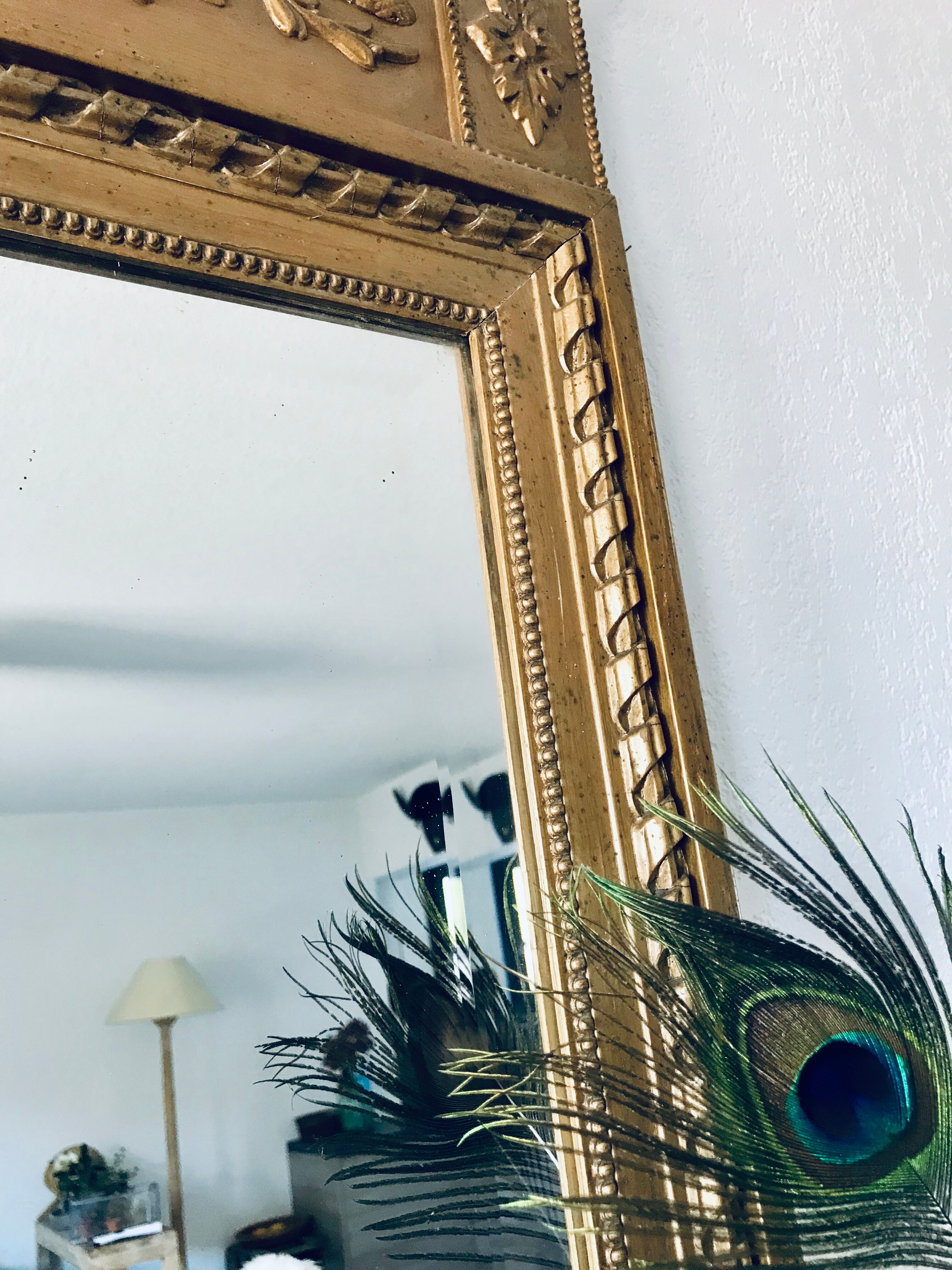 Gilded and beveled pier mirror 88x58cm