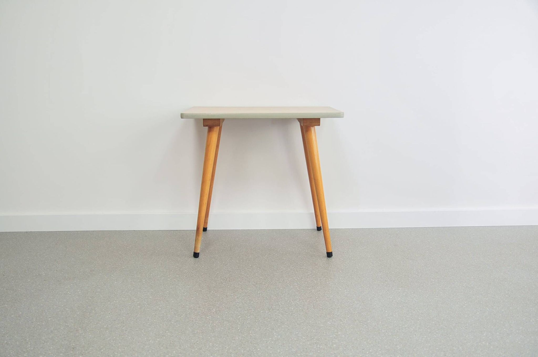 Vintage wooden table with conical legs