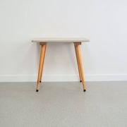 Vintage wooden table with conical legs