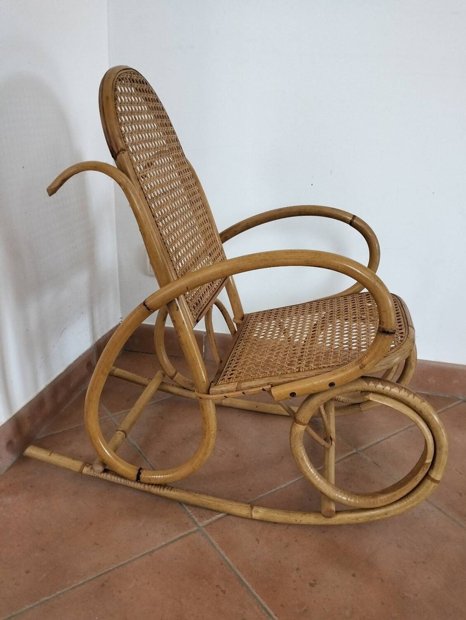 Child's rocking chair in bamboo and cane