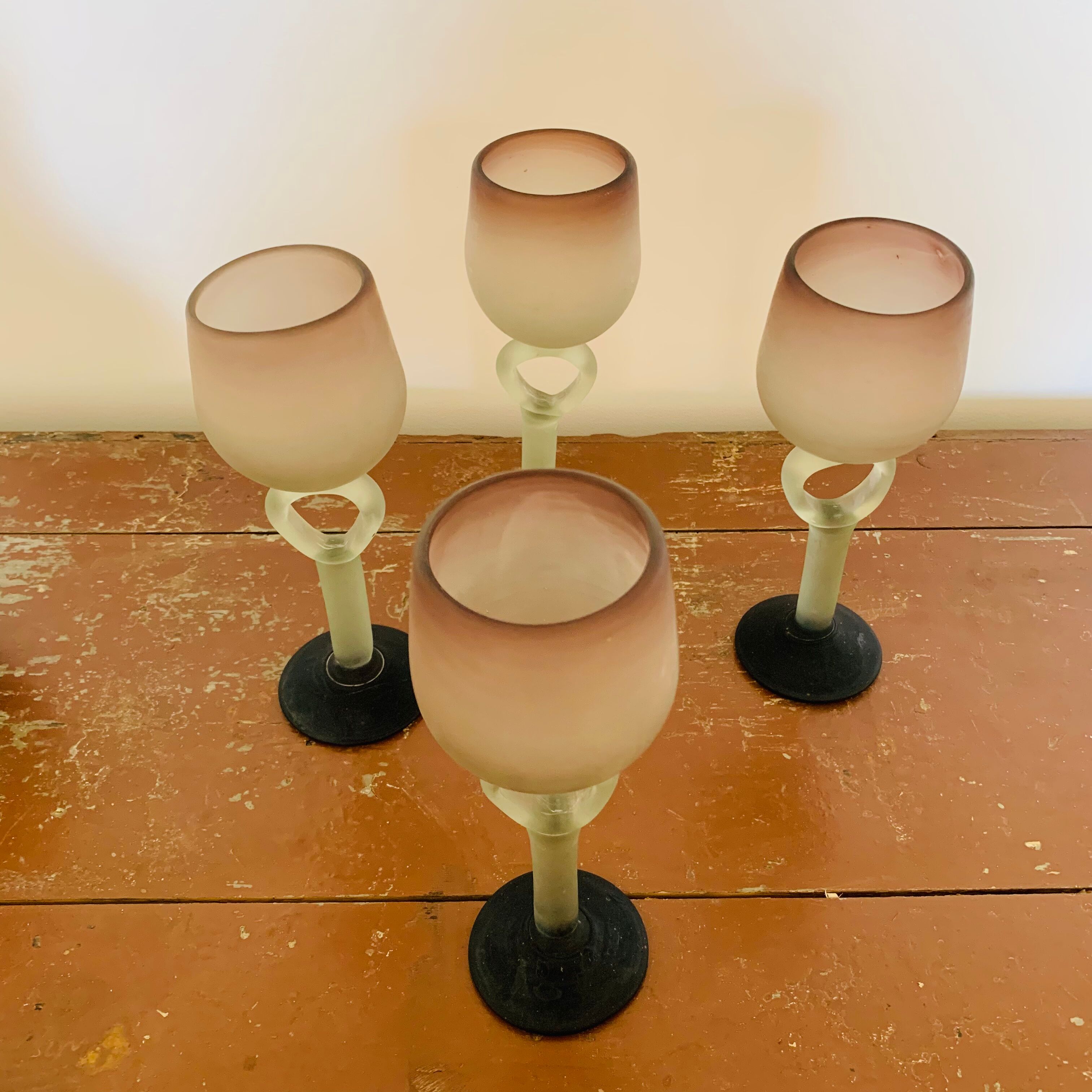 Set of 4 stemmed glasses and 1 glass paste carafe
