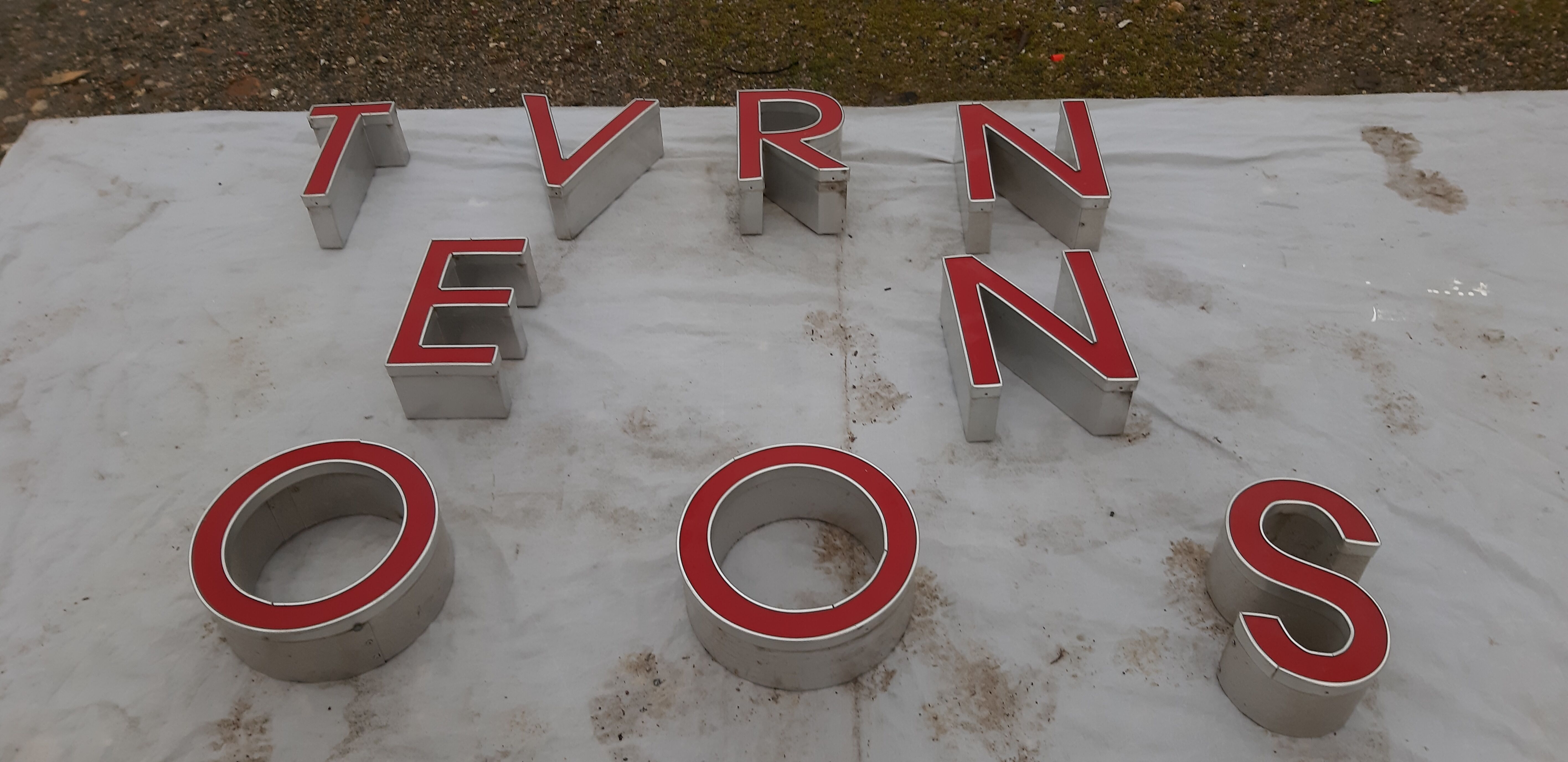 9 luminous industrial letters