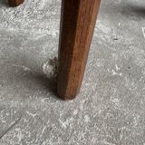 Dark brown solid oak brutalist stool with sculptural backrest, handcrafted mid-century rustic primitive