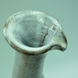 Pitcher at the leaning collar in snarl