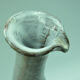 Pitcher at the leaning collar in snarl