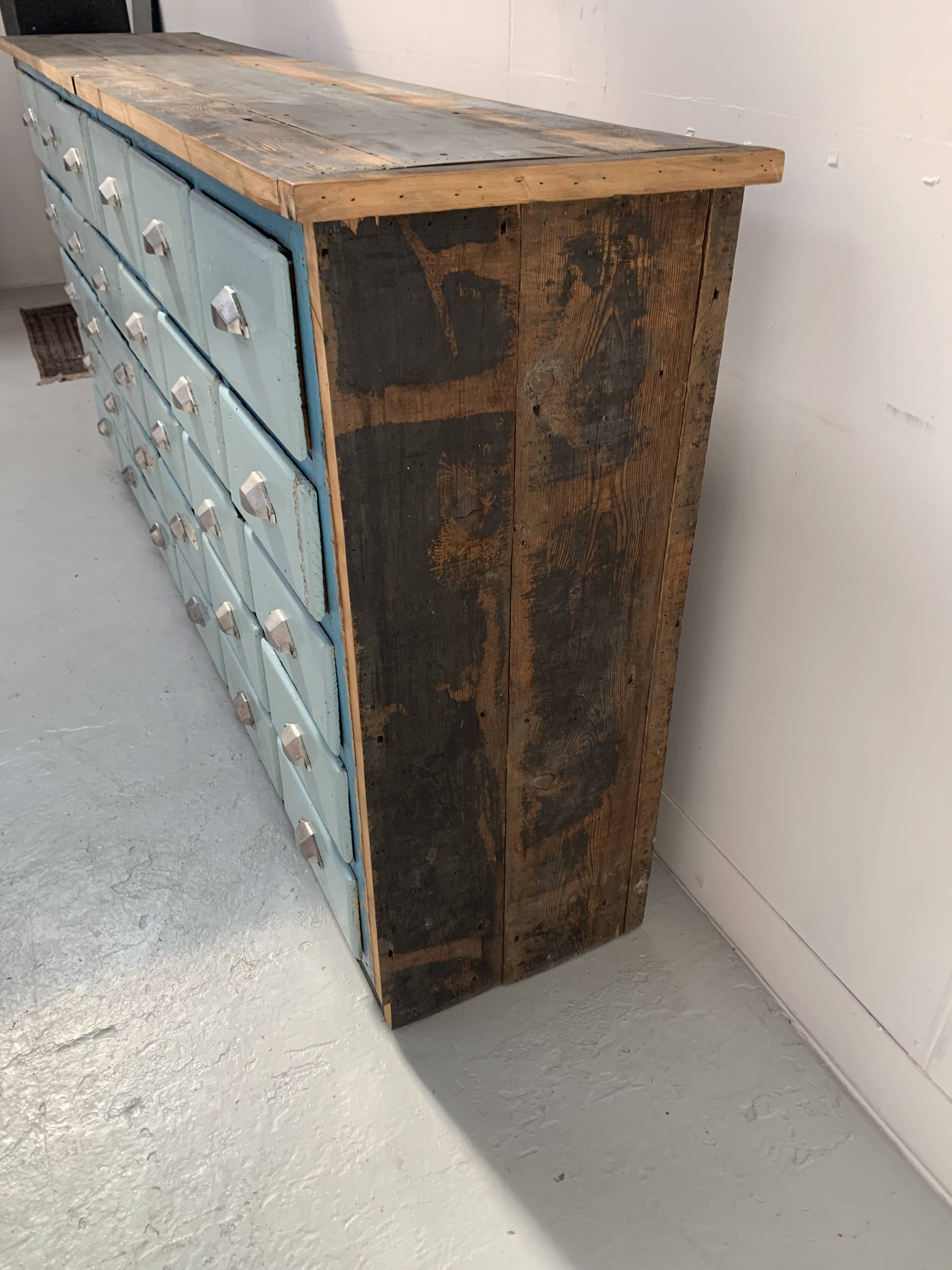 30-drawer storage unit in patinated fir, 20th century