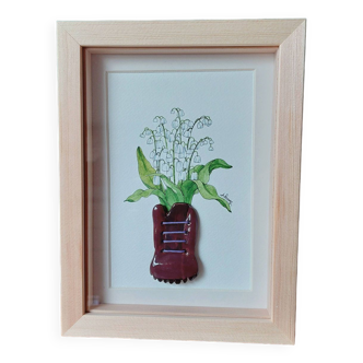 Composition of a bouquet of lilies of the valley in a shoe-shaped clay pot