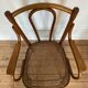 Old thonet armchair in curved wood and rattan cane