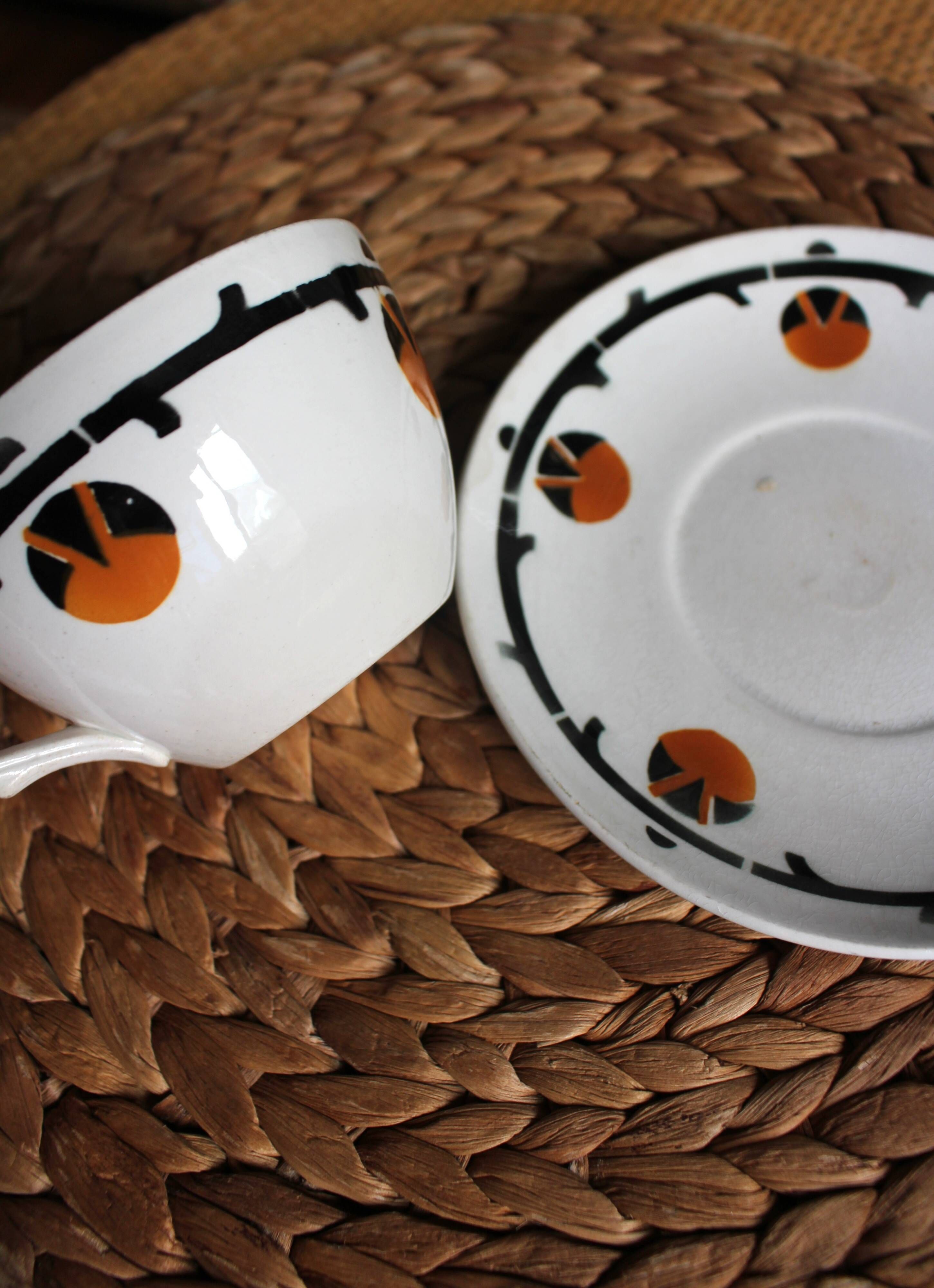 A large cup of chocolate tea, saucer Badonviller Barcarolle orange black.