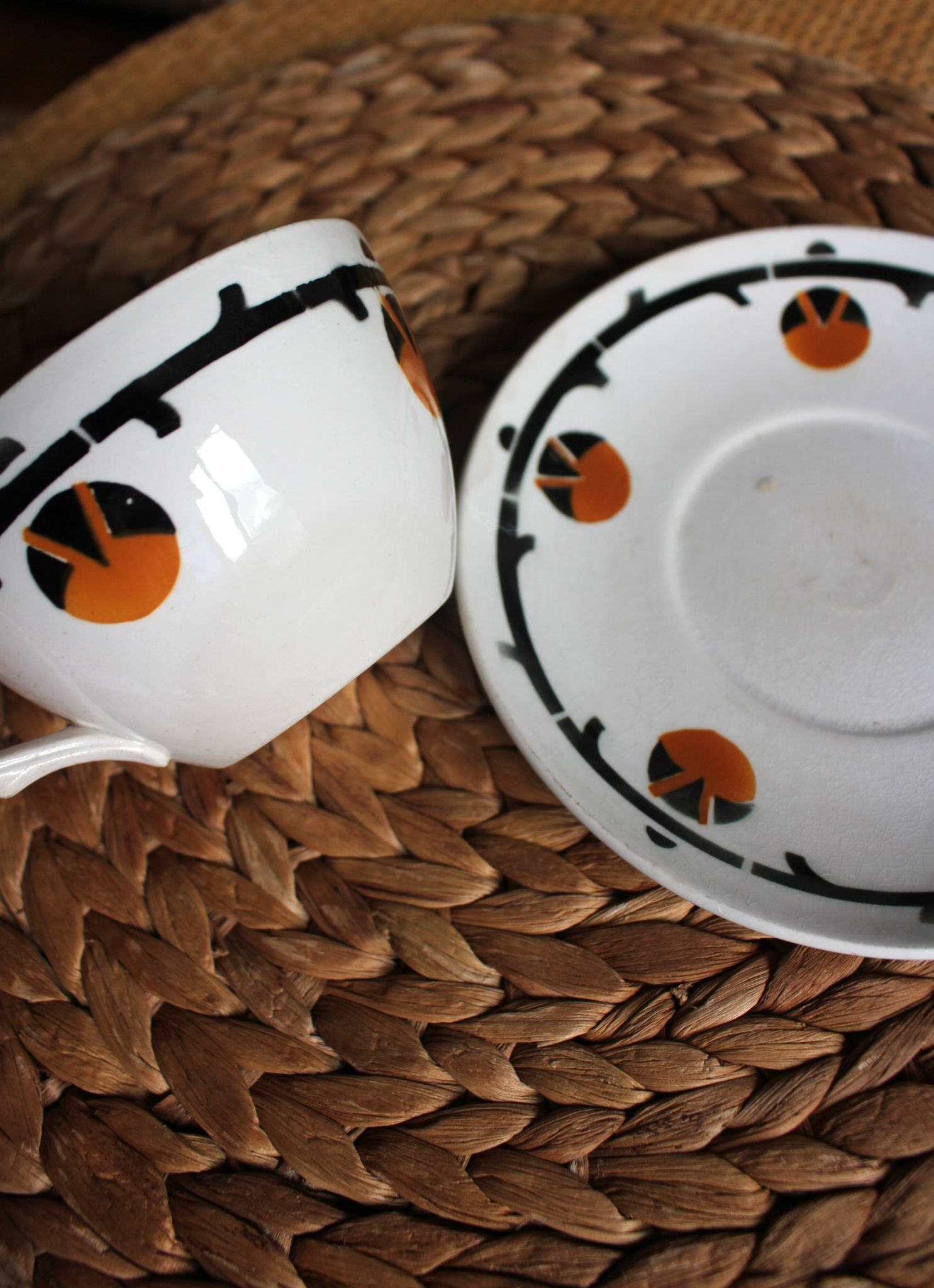 A large cup of chocolate tea, saucer Badonviller Barcarolle orange black.