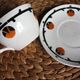 A large cup of chocolate tea, saucer Badonviller Barcarolle orange black.