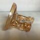 Double iridescent yellow marigold carnival candle holder