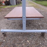 Iron and wood industrial rolling table