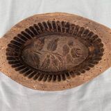 Butter mold and wooden spoon