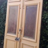 Porte d'entrée cintrée double en chêne, grilles et verre, XIXème