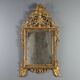 Antique mirror in gilded lime wood, Baroque sculptures, 18th century