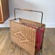 large wicker / rattan and black iron magazine rack from the 70s