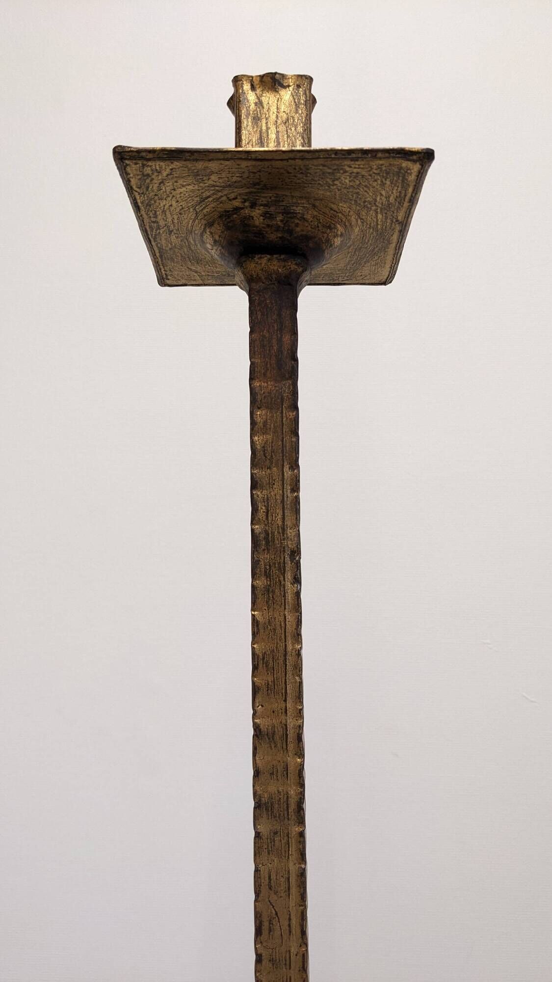 Brutalist floor candle holder in hammered gold steel, Belgium circa 1960.