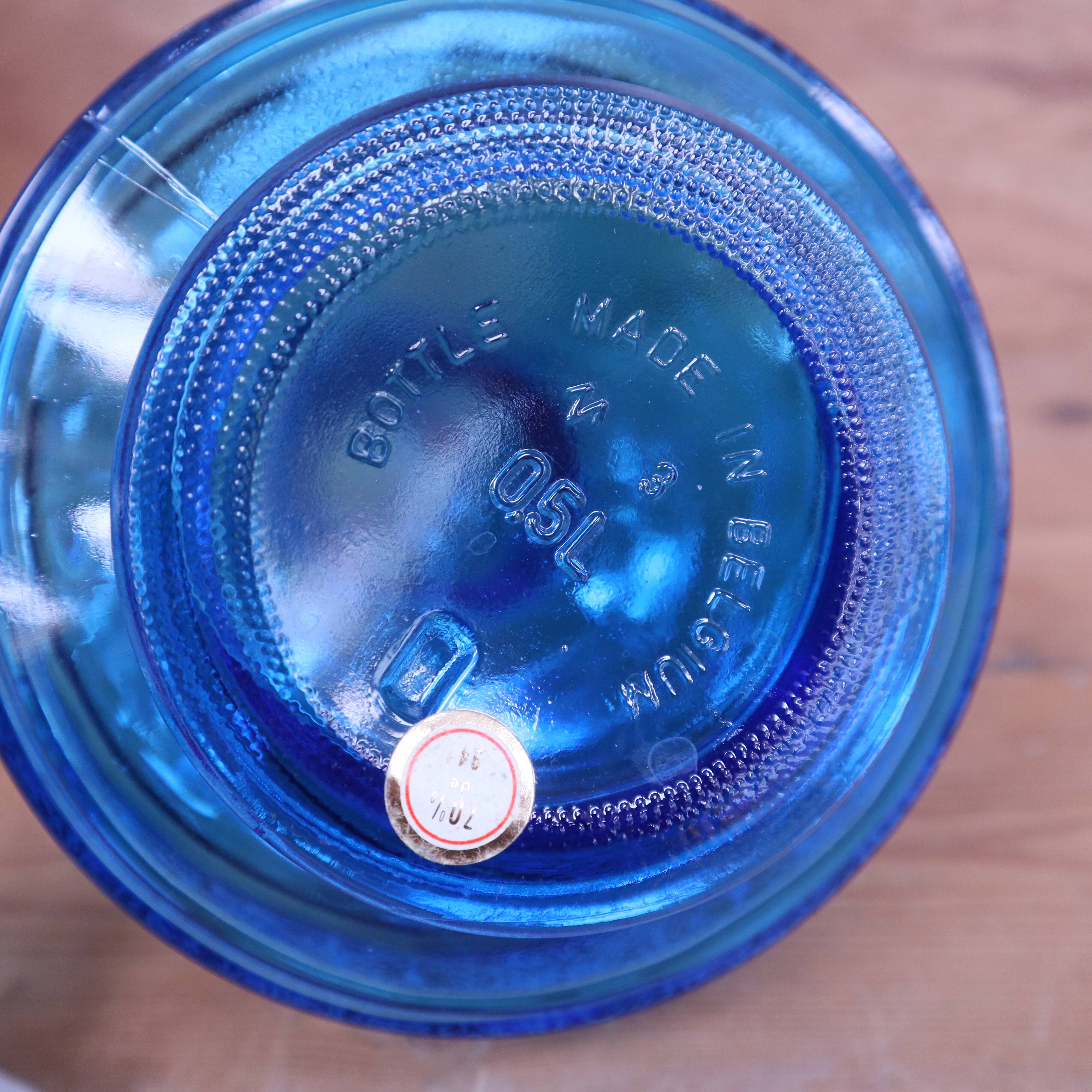 Deep Caribbean blue vintage glass carafe made in Belgium.