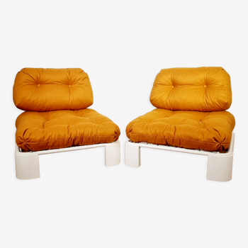 Pair of white metal and plastic pop low armchairs, orange fabric, circa 1970
