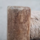 Vintage handmade wooden stool and rope
