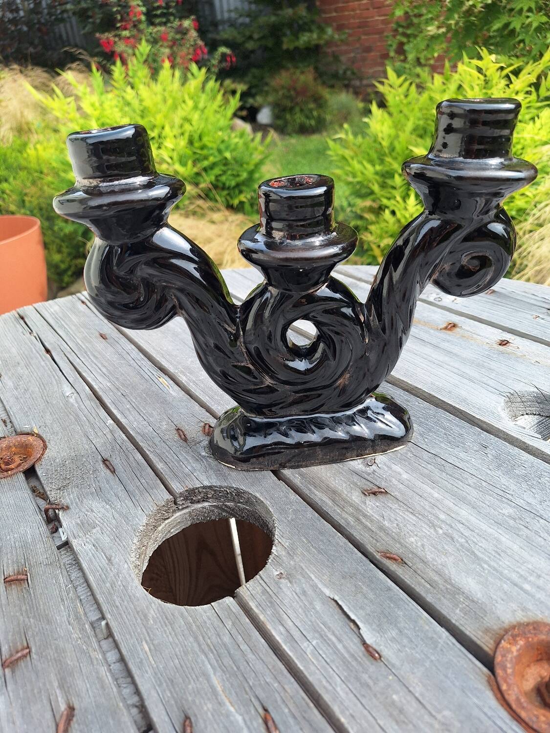 Iridescent black ceramic candle holder