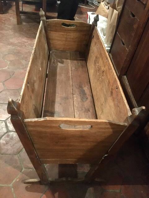 Antique wooden rocking cradle
