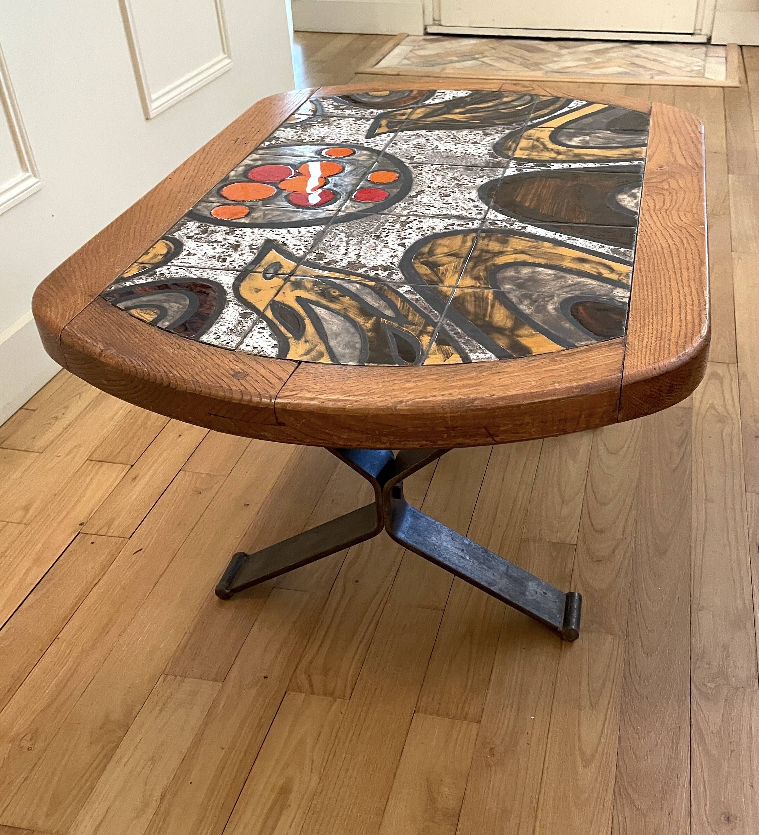 Ceramic coffee table with metal base by G. Reynaud Vallauris