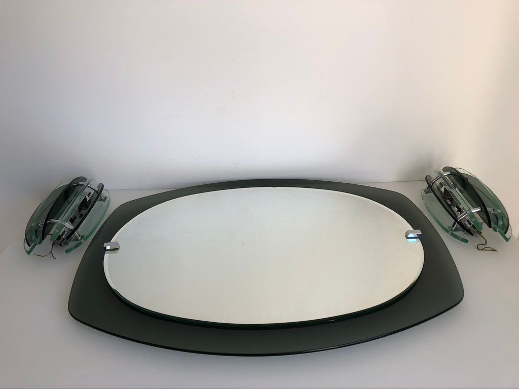 Veca mirror and 2 matching Veca wall lights made in Italy.