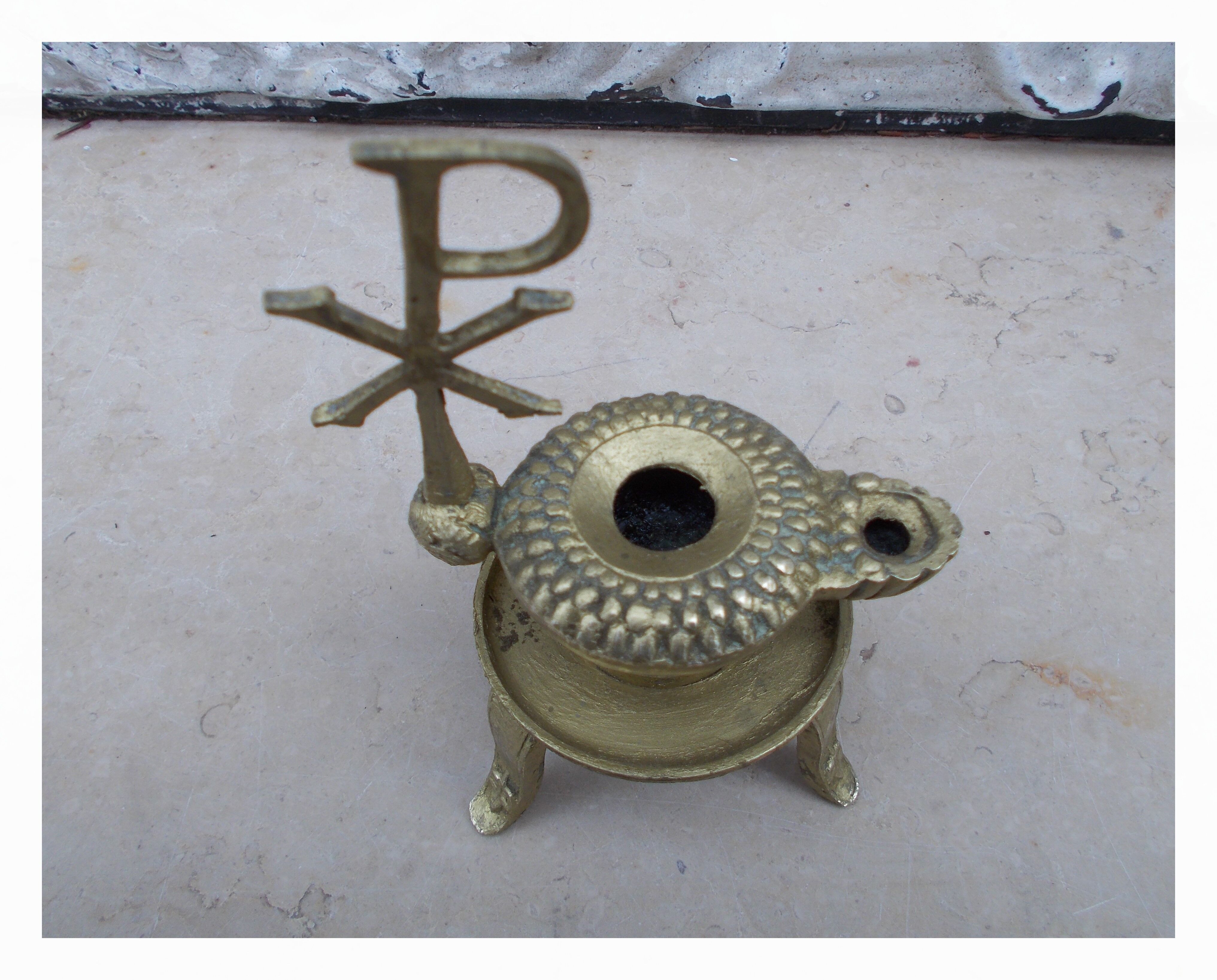 Old bronze oil lamp religious symbol Christ