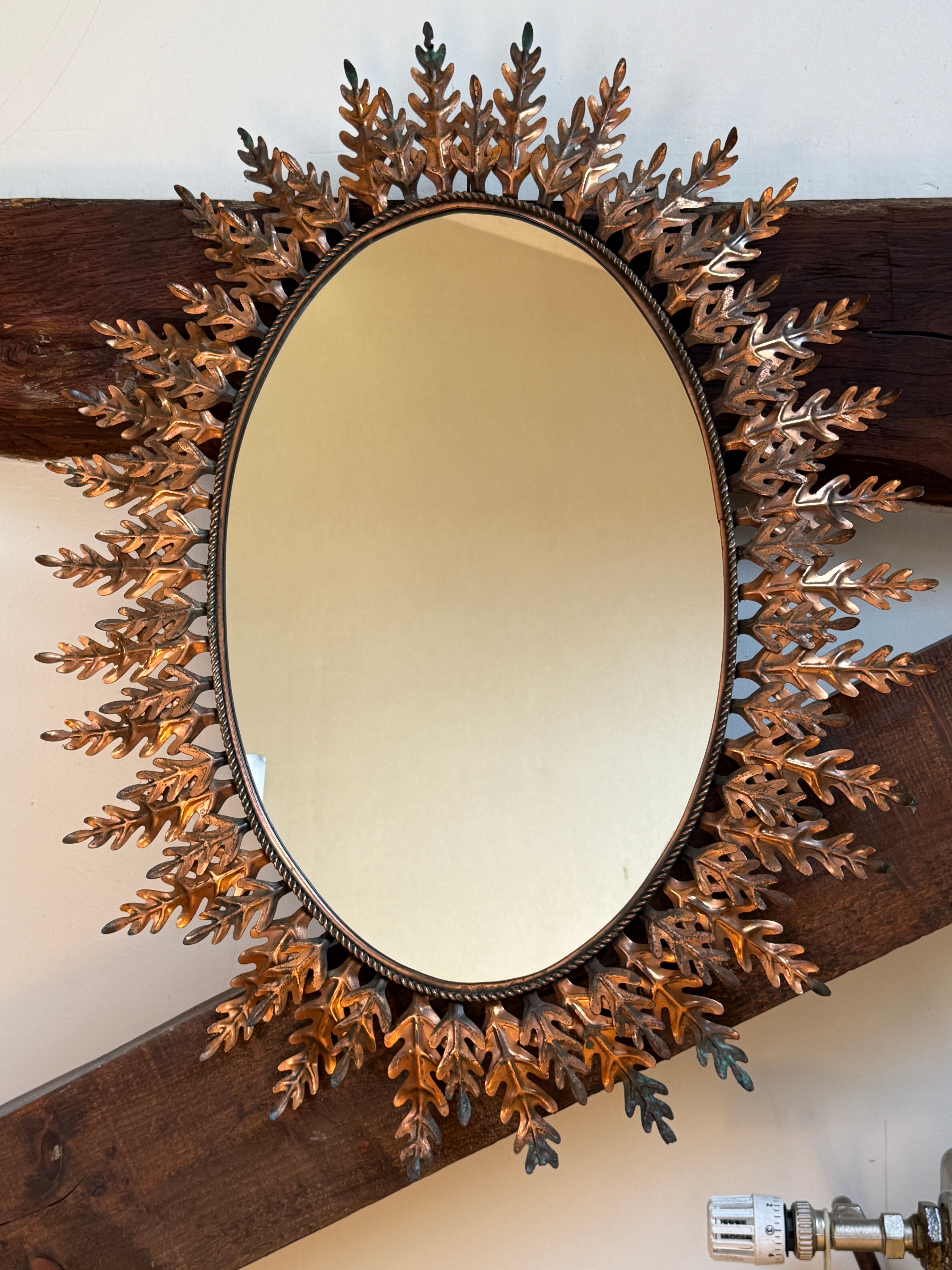 Oval sun mirror wrought iron from the 1950s Italy