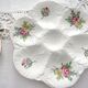 Pair of oyster plates, ceramic, flowers
